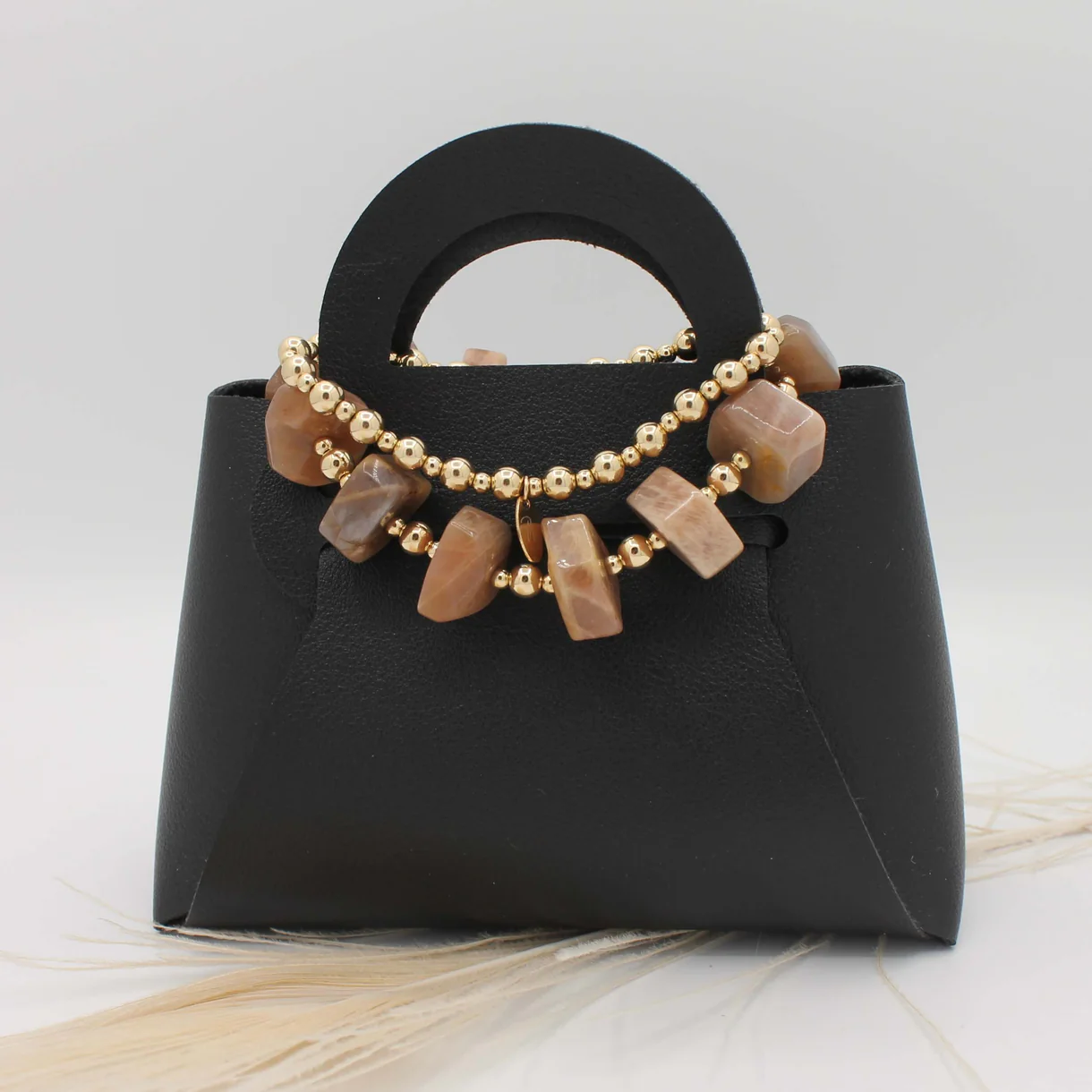 PaulinaM - Handgemaakte, high end armbanden, oorbellen en Colliers